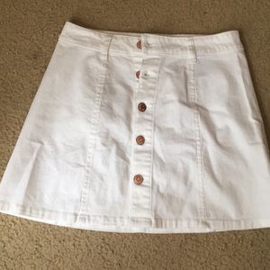 white buttoned up skirt